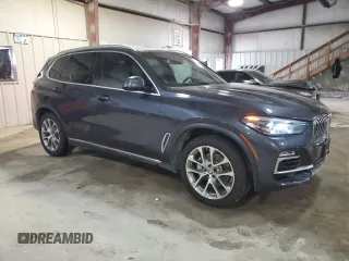 2020 BMW X5 sDrive40i with VIN 5UXCR4C00L9C26093, listed as a Copart auction lot 81833724 with 66,583 mi miles and Clean title. Bid and sale history available at DreamBid. Image 4.