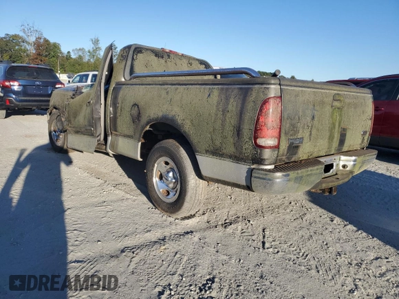 2002 Ford F-150 XL with VIN 1FTRF17W42NA89079, listed as a Copart auction lot 76519634 with Not Provided miles and Salvage Title. Bid and sale history available at carsss.com. Image 2.