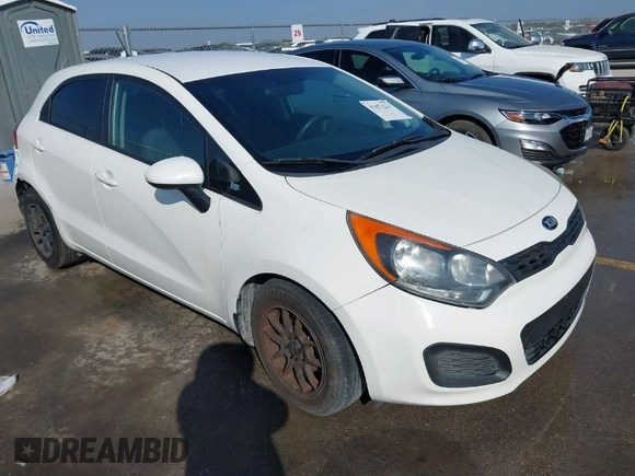 2015 Kia Rio LX with VIN KNADM5A39F6500074, listed as a IAAI auction lot 41871224 with 126,209 mi miles. Bid and sale history available at carsss.com. Image 1.