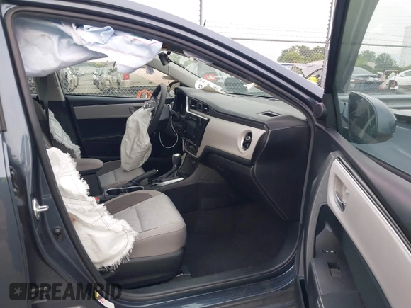 2018 Toyota Corolla L with VIN 2T1BURHE1JC007046, listed as a IAAI auction lot 42417100 with 69,845 mi miles and . Bid and sale history available at DreamBid. Image 5.