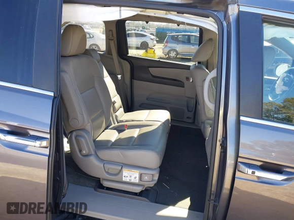 2016 Honda Odyssey EX-L with VIN 5FNRL5H69GB047902, listed as a IAAI auction lot 40795564 with 124,788 mi miles. Bid and sale history available at carsss.com. Image 8.