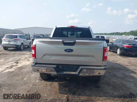 2018 Ford F-150 XL with VIN 1FTEW1E50JFE38143, listed as a IAAI auction lot 42426811 with 115,430 mi miles and . Bid and sale history available at DreamBid. Image 16.