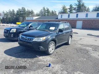 2013 Subaru Forester 2.5X Premium with VIN JF2SHADC6DH441989, listed as a IAAI auction lot 41904752 with 201,903 mi miles. Bid and sale history available at carsss.com. Image 2.