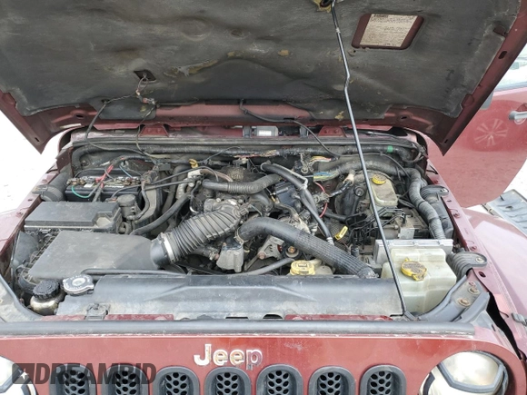 2007 Jeep Wrangler Unlimited Sahara z VIN 1J4GA59127L113178, wystawiony jako Copart lot #47443535 z przebiegiem 250 355 mil mil oraz Szkoda całkowita • Salvage title. Historia ofert i sprzedaży dostępna na DreamBid. Obrazek 12.