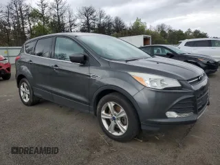 2016 Ford Escape SE z VIN 1FMCU9G97GUC12743, wystawiony jako Copart lot #56578935 z przebiegiem 150 574 mil mil oraz Tytuł czysty. Historia ofert i sprzedaży dostępna na DreamBid. Obrazek 4.