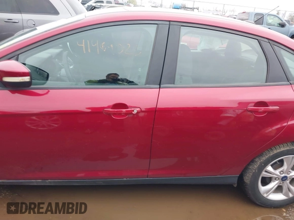 2013 Ford Focus SE z VIN 1FADP3F27DL324354, wystawiony jako IAAI lot #41909025 z przebiegiem 99 096 mil mil oraz . Historia ofert i sprzedaży dostępna na DreamBid. Obrazek 15.