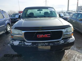 1999 GMC New Sierra 1500 SLE with VIN 1GTEK14T4XE539051, listed as a IAAI auction lot 41472124 with 151,088 mi miles. Bid and sale history available at carsss.com. Image 12.