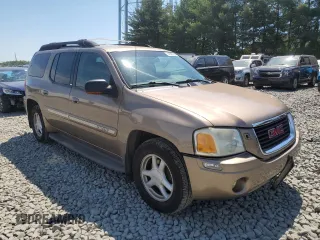 2003 GMC Envoy SLT with VIN 1GKET16S136235010, listed as a Copart auction lot 57380734 with 161,818 mi miles and Salvage Title. Bid and sale history available at DreamBid. Image 4.