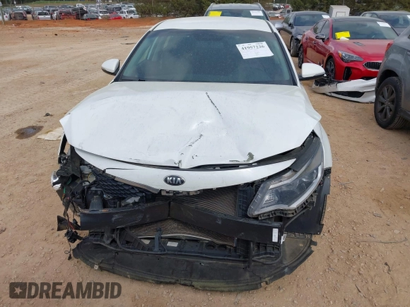 2017 Kia Optima LX z VIN 5XXGT4L39HG133028, wystawiony jako IAAI lot #41957226 z przebiegiem 92 366 mil mil oraz . Historia ofert i sprzedaży dostępna na DreamBid. Obrazek 12.