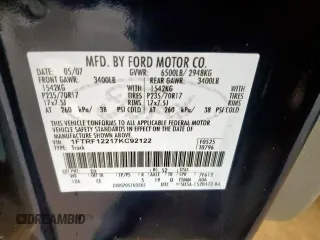 2007 Ford F-150 XL with VIN 1FTRF12217KC92122, listed as a Copart auction lot 60499615 with 110,510 mi miles and Salvage title. Bid and sale history available at DreamBid. Image 12.