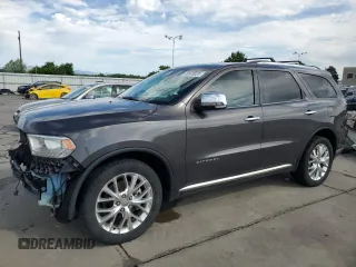 2014 Dodge Durango Citadel with VIN 1C4SDJET7EC358823, listed as a Copart auction lot 59920025 with 170,964 mi miles and Salvage title. Bid and sale history available at DreamBid. Image 1.