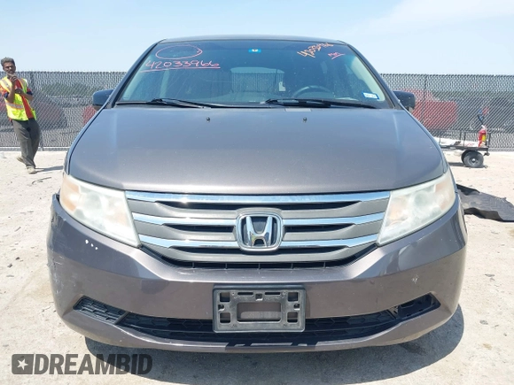 2012 Honda Odyssey EX with VIN 5FNRL5H41CB011940, listed as a IAAI auction lot 42033966 with 182,996 mi miles and . Bid and sale history available at DreamBid. Image 12.