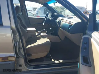 1999 Jeep Grand Cherokee Laredo with VIN 1J4GW58S4XC787702, listed as a IAAI auction lot 41663680 with 177,256 mi miles. Bid and sale history available at carsss.com. Image 5.