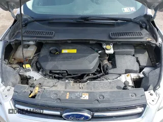 2016 Ford Escape Titanium with VIN 1FMCU9JX3GUA62802, listed as a IAAI auction lot 42001690 with 124,452 mi miles. Bid and sale history available at carsss.com. Image 10.