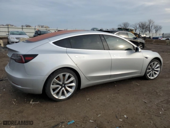 2018 Tesla Model 3 Long Range Battery with VIN 5YJ3E1EA3JF048326, listed as a Copart auction lot 42511275 with 130,965 mi miles and Salvage Title. Bid and sale history available at carsss.com. Image 3.