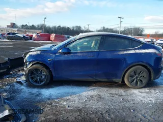 2024 Tesla Model Y Long Range with VIN 7SAYGDEE2RF129577, listed as a IAAI auction lot 41357180 with 6,697 mi miles and . Bid and sale history available at DreamBid. Image 14.