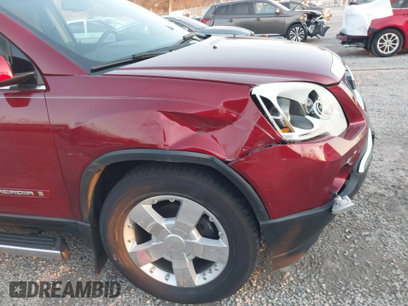 2007 GMC Acadia SLT with VIN 1GKEV337X7J140891, listed as a IAAI auction lot 41784554 with 131,221 mi miles. Bid and sale history available at carsss.com. Image 6.