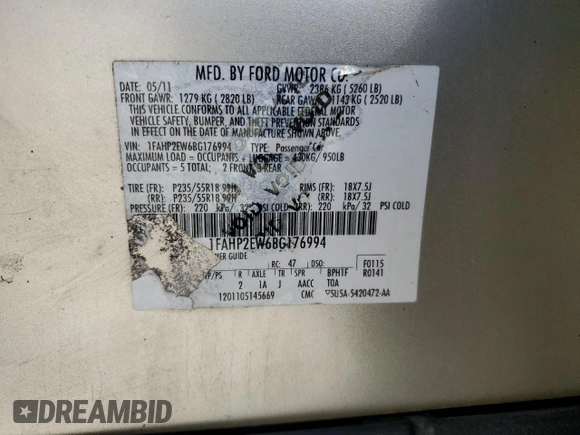 2011 Ford Taurus SEL z VIN 1FAHP2EW6BG176994, wystawiony jako Copart lot #56154735 z przebiegiem 211 017 mil mil oraz Szkoda całkowita • Salvage title. Historia ofert i sprzedaży dostępna na DreamBid. Obrazek 12.