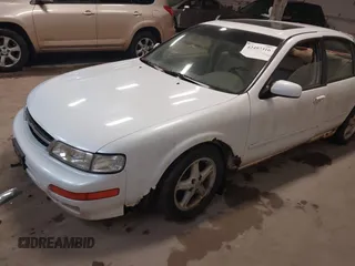 1998 Nissan Maxima GXE z VIN JN1CA21A9WM805626, wystawiony jako IAAI lot #42497316 z przebiegiem 195 991 mil mil oraz . Historia ofert i sprzedaży dostępna na DreamBid. Obrazek 2.