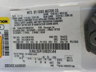 2014 Lincoln MKZ z VIN 3LN6L2G91ER820544, wystawiony jako Copart lot #56049535 z przebiegiem 211 323 mil mil oraz Szkoda całkowita • Salvage title. Historia ofert i sprzedaży dostępna na DreamBid. Obrazek 12.