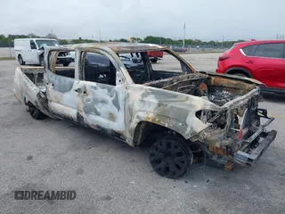 2023 Toyota Tacoma SR5 z VIN 3TMAZ5CN8PM213333, wystawiony jako IAAI lot #41475450 z przebiegiem Nie podano mil oraz . Historia ofert i sprzedaży dostępna na DreamBid. Obrazek 1.