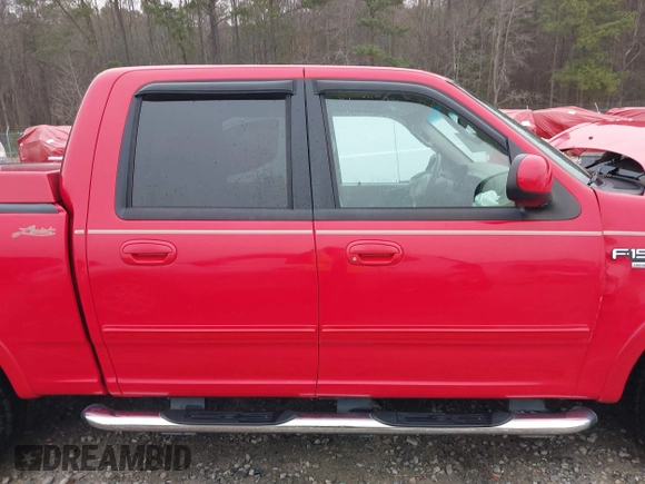 2003 Ford F-150 XLT with VIN 1FTRW07LX3KA76162, listed as a IAAI auction lot 41783926 with 119,009 mi miles. Bid and sale history available at carsss.com. Image 13.