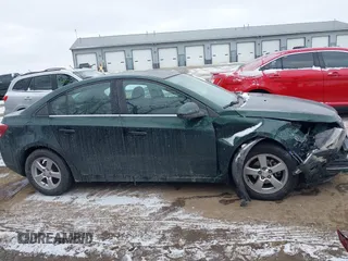 2015 Chevrolet Cruze LT with VIN 1G1PC5SB5F7217036, listed as a IAAI auction lot 41618670 with 141,615 mi miles and . Bid and sale history available at DreamBid. Image 13.