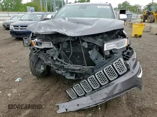 2017 Jeep Grand Cherokee Overland with VIN 1C4RJFCG8HC607872, listed as a Copart auction lot 57493195 with 164,478 mi miles and Salvage title. Bid and sale history available at DreamBid. Image 15.