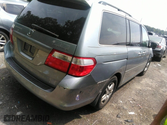 2006 Honda Odyssey EX-L with VIN 5FNRL38706B107724, listed as a IAAI auction lot 39245592 with 186,885 mi miles. Bid and sale history available at carsss.com. Image 4.