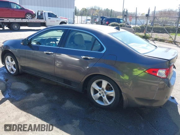 2009 Acura TSX with VIN JH4CU26659C027813, listed as a IAAI auction lot 41848415 with 216,257 mi miles. Bid and sale history available at carsss.com. Image 3.