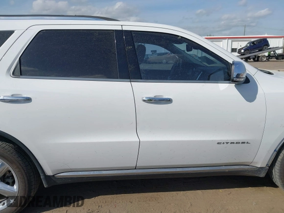 2013 Dodge Durango Citadel with VIN 1C4RDJEG0DC665962, listed as a IAAI auction lot 41900527 with 173,550 mi miles and . Bid and sale history available at carsss.com. Image 14.