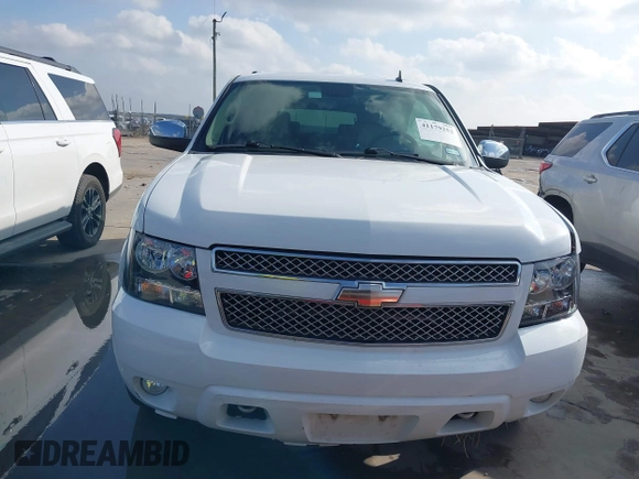 2010 Chevrolet Suburban LTZ with VIN 1GNUKKE34AR189475, listed as a IAAI auction lot 41179252 with 127,132 mi miles. Bid and sale history available at carsss.com. Image 12.