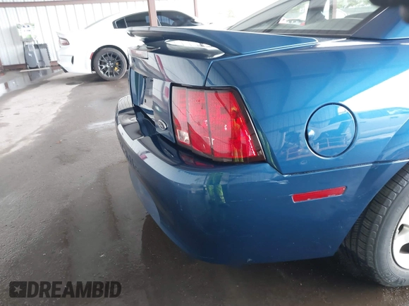 1999 Ford Mustang with VIN 1FAFP4040XF124637, listed as a IAAI auction lot 41793662 with 54,591 mi miles and . Bid and sale history available at DreamBid. Image 6.