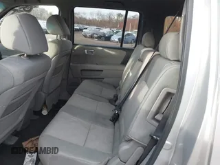 2010 Honda Pilot LX with VIN 5FNYF4H29AB002203, listed as a IAAI auction lot 40858777 with 128,621 mi miles and . Bid and sale history available at DreamBid. Image 8.