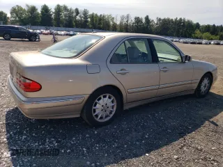 2000 Mercedes-Benz E-Class with VIN WDBJF65J2YB165568, listed as a Copart auction lot 70003994 with 146,518 mi miles and Salvage Title. Bid and sale history available at carsss.com. Image 3.
