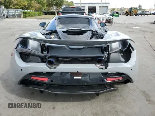 2022 McLaren 720S z VIN SBM14FCA4NW006444, wystawiony jako Copart lot #45854525 z przebiegiem Nie podano mil oraz Szkody całkowita. Historia ofert i sprzedaży dostępna na DreamBid. Obrazek 6.