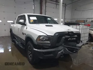 2017 Ram 1500 Rebel z VIN 1C6RR7YT1HS546060, wystawiony jako IAAI lot #41133784 z przebiegiem 94 935 mil mil oraz . Historia ofert i sprzedaży dostępna na DreamBid. Obrazek 1.
