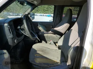 2013 GMC Savana z VIN 1GJZ71FG1D1143013, wystawiony jako Copart lot #74561864 z przebiegiem 268 778 mil mil oraz Szkoda całkowita • Salvage title. Historia ofert i sprzedaży dostępna na DreamBid. Obrazek 7.