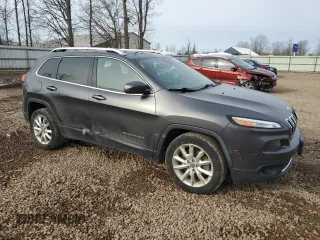 2015 Jeep Cherokee Limited with VIN 1C4PJLDB7FW701648, listed as a Copart auction lot 49612655 with 118,760 mi miles and Salvage Title. Bid and sale history available at DreamBid. Image 4.