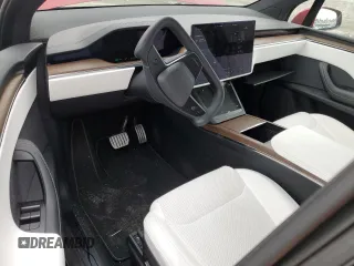 2023 Tesla Model X with VIN 7SAXCAE51PF390573, listed as a Copart auction lot 47499385 with Not Provided miles and Salvage Title. Bid and sale history available at DreamBid. Image 8.