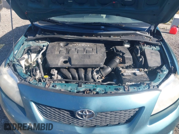 2009 Toyota Corolla with VIN 1NXBU40E39Z018168, listed as a IAAI auction lot 42661070 with 249,008 mi miles and . Bid and sale history available at DreamBid. Image 10.