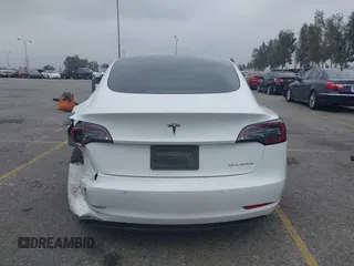 2020 Tesla Model 3 Long Range with VIN 5YJ3E1EB0LF803217, listed as a IAAI auction lot 41871940 with 130,391 mi miles. Bid and sale history available at carsss.com. Image 16.