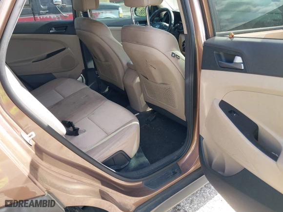 2016 Hyundai Tucson SE with VIN KM8J23A4XGU180300, listed as a IAAI auction lot 42123067 with 123,804 mi miles. Bid and sale history available at carsss.com. Image 8.