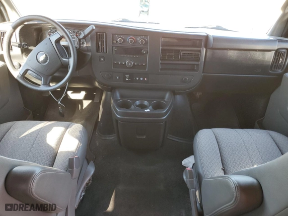 2014 Chevrolet Express Passenger LT with VIN 1GAZG1FG9E1197581, listed as a Copart auction lot 76876634 with 41,840 mi miles and Salvage Title. Bid and sale history available at carsss.com. Image 8.