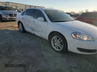 2014 Chevrolet Impala LTZ with VIN 2G1WC5E36E1151883, listed as a Copart auction lot 49337525 with 172,803 mi miles and Salvage Title. Bid and sale history available at DreamBid. Image 11.