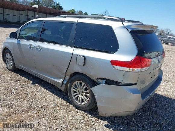 2014 Toyota Sienna XLE with VIN 5TDYK3DC2ES450918, listed as a IAAI auction lot 41732591 with 160,893 mi miles. Bid and sale history available at carsss.com. Image 3.