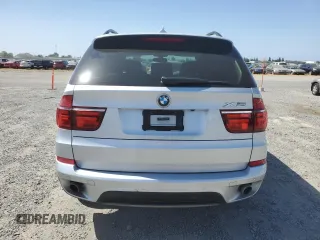 2012 BMW X5 35i with VIN 5UXZV4C5XCL751020, listed as a Copart auction lot 59327845 with 106,249 mi miles and Salvage title. Bid and sale history available at DreamBid. Image 6.