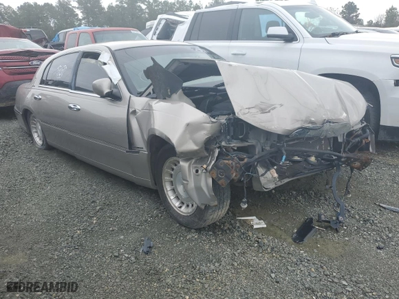 2001 Lincoln Town Car Executive with VIN 1LNHM81W91Y733042, listed as a Copart auction lot 82078563 with 0 mi miles and Salvage Title. Bid and sale history available at carsss.com. Image 4.