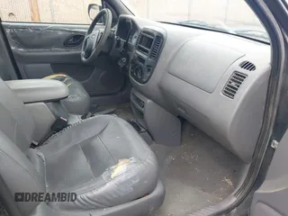 2001 Ford Escape XLT with VIN 1FMCU041X1KA93910, listed as a IAAI auction lot 42270271 with 151,166 mi miles and . Bid and sale history available at DreamBid. Image 5.