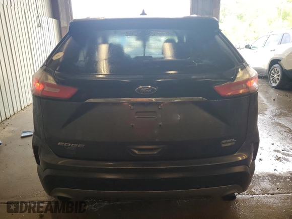 2019 Ford Edge SEL with VIN 2FMPK4J93KBC72097, listed as a Copart auction lot 59540395 with 85,891 mi miles and Salvage title. Bid and sale history available at DreamBid. Image 6.